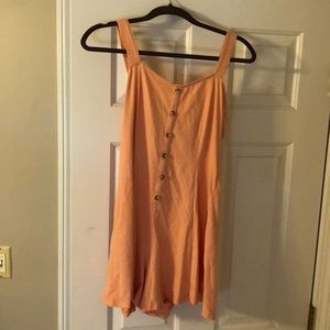Peach romper with buttons
